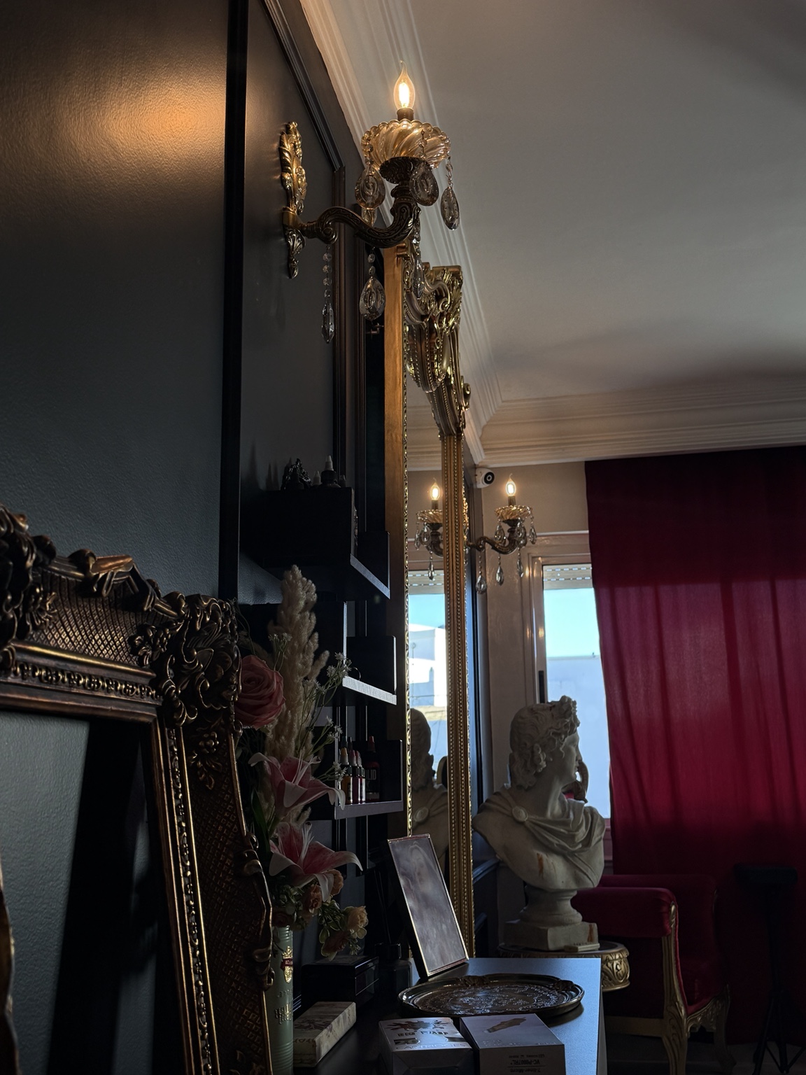A warmly lit corner of the Atelier Noir studio
